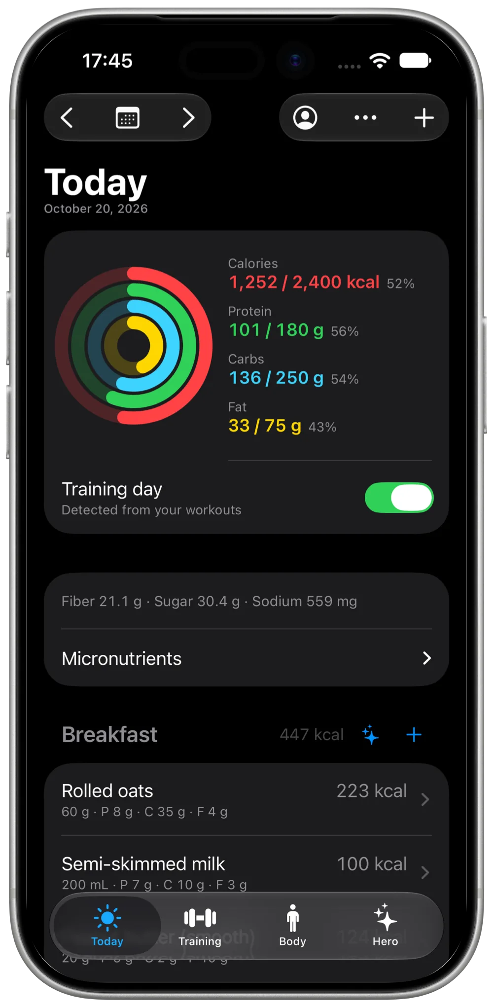 Progress+ Today screen with calorie and macro rings and a meal list